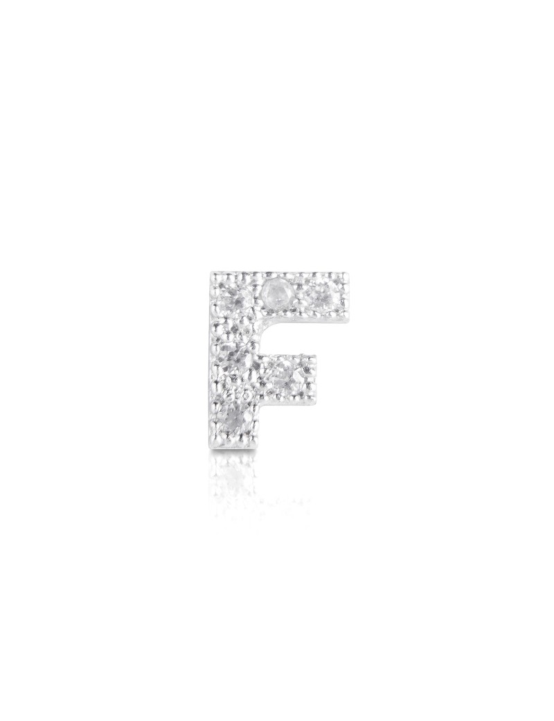 silver earring and cubic zirconia initial F