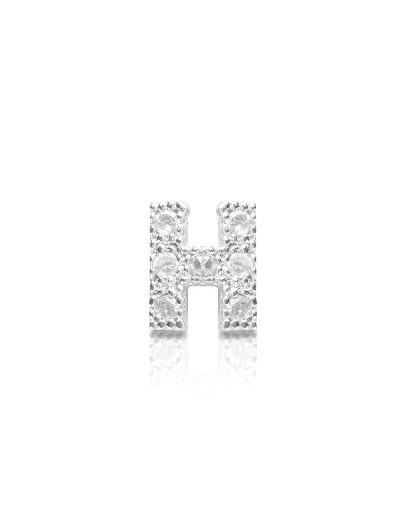 silver earring and cubic zirconia initial H