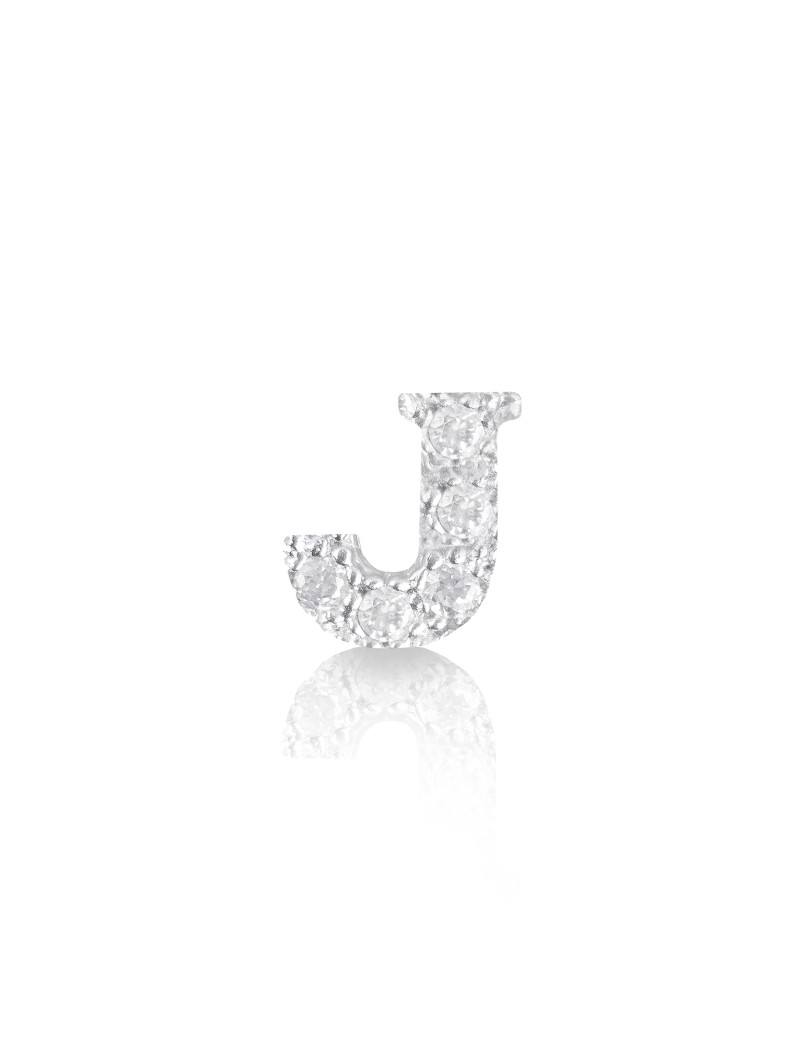 silver earring and cubic zirconia initial J