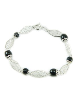 Armband bestehend aus Su Coccu und durchbrochenen Diamanten aus Silber