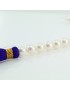 Strand of white Japanese Akoya spherical pearls Thigh