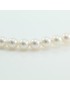 Strand of top quality spherical white Japanese Akoya pearls Thigh