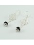 Sardinian women's silver honeycomb earrings with su coccu