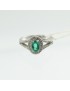 Women's classic white gold ring with emerald and diamonds