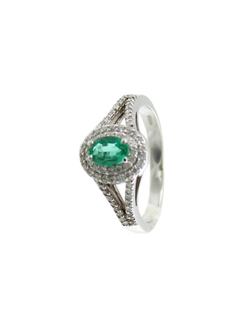 Women's classic white gold ring with emerald and diamonds