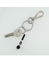 Sardinian Su Coccu men's keychain in silver filigree and black onyx stone