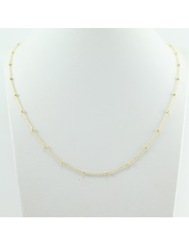 Women's yellow gold choker necklace with polished faceted interspheres