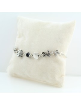 Bracciale donna coccu con simboli sardegna moro pavoncella e dea madre