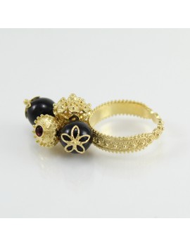 Anello su coccu dorato da donna